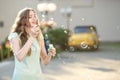 Happy woman blowing soap bubbles Royalty Free Stock Photo