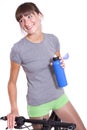 Happy woman with bottle and bike Royalty Free Stock Photo