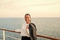 Happy woman with business jacket on shipboard in miami, usa. Travelling for business. Sensual woman smile on ship board
