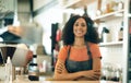Happy woman, cafe and portrait of small business owner with arms crossed in confidence at coffee shop. Female person Royalty Free Stock Photo