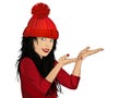 Happy woman in a cap showing gesture with two hands Royalty Free Stock Photo