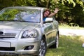 Happy woman in car