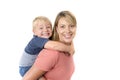 Happy woman carrying her adorable 3 years old little boy on her back smiling happy and cheerful in family mother and son together Royalty Free Stock Photo