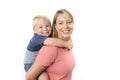 Happy woman carrying her adorable 3 years old little boy on her back smiling happy and cheerful in family mother and son together Royalty Free Stock Photo