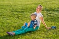 Happy woman and child having fun outdoor on meadow Royalty Free Stock Photo