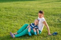 Happy woman and child having fun outdoor on meadow Royalty Free Stock Photo