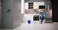Happy Woman Cleaning Floor With Mop In Kitchen Royalty Free Stock Photo