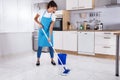 Woman Cleaning Floor With Mop Royalty Free Stock Photo