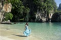 Happy woman on clear blue sea beach Royalty Free Stock Photo