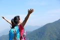 Happy woman climber mountain peak
