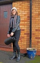 Happy woman collecting fuel for a multi-fuel stove 3, during a cold winter. Royalty Free Stock Photo