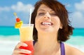 Happy woman with colorful cocktail