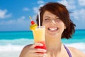 Happy woman with colorful cocktail