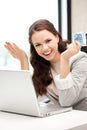 Happy woman with computer and euro cash money Royalty Free Stock Photo