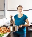 Happy woman cooking with lobster Royalty Free Stock Photo