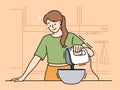 Happy woman cooking with mixer at home Royalty Free Stock Photo
