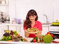 Happy woman cooking pizza. Royalty Free Stock Photo