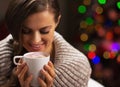 Happy woman with cup of hot chocolate with marshmallow Royalty Free Stock Photo