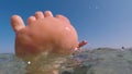 Mom with baby in the water while relaxing at sea. Ocean tourism and recreation.