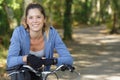 happy woman cyclist looking at camera Royalty Free Stock Photo