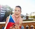 Happy woman with Czech flag showing thumbs up. Prague Royalty Free Stock Photo