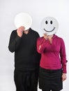 Happy woman and a deadpan man Royalty Free Stock Photo