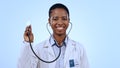 Happy woman, doctor and stethoscope for healthcare in studio of blue background for mock up in medicine. Portrait, black Royalty Free Stock Photo
