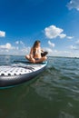 happy woman with dog on supboard