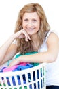 Happy woman doing laundry Royalty Free Stock Photo