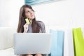 Happy woman doing online shopping Royalty Free Stock Photo