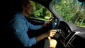 Happy woman driving car and listening to music, energy and positive in morning Royalty Free Stock Photo