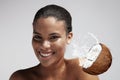 Happy woman with a drops of a coconut milk on her skin Royalty Free Stock Photo