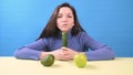 Happy woman eating cucumber with plesure. Healthy eating concept. Royalty Free Stock Photo