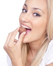 Happy woman eating praline