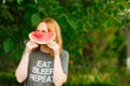 Happy woman eating watermelon on garden Royalty Free Stock Photo
