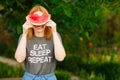 Happy woman eating watermelon on garden Royalty Free Stock Photo