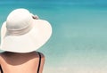 Happy woman enjoying beach relaxing joyful in summer by tropical blue water. Beautiful bikini model happy on travel wearing beach Royalty Free Stock Photo