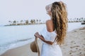 Happy woman enjoying beach relaxing joyful in summer by tropical blue water Royalty Free Stock Photo