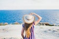 Happy woman enjoying beach relaxing joyful in summer by tropical blue water. Beautiful model happy on travel wearing Royalty Free Stock Photo