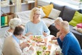 Happy woman enjoying dinner with friends Royalty Free Stock Photo