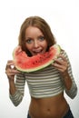 Happy woman enjoying eating a slice of watermelon Royalty Free Stock Photo