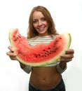 Happy woman enjoying eating a slice of watermelon Royalty Free Stock Photo