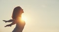 Happy woman enjoying freedom with open hands on sea Royalty Free Stock Photo