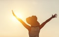 Happy woman enjoying freedom with open hands on sea Royalty Free Stock Photo