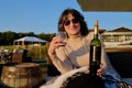 Happy Woman Enjoying Glass of Wine Outdoors Royalty Free Stock Photo