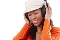 Happy woman enjoying music through earphones Royalty Free Stock Photo