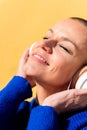 happy woman enjoying music on headphones Royalty Free Stock Photo