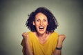 Happy woman exults pumping fists ecstatic celebrates success Royalty Free Stock Photo