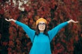 Happy Woman with Eyeglasses and Pumpkin Beret Enjoying Autumn Royalty Free Stock Photo