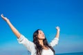 Happy woman with eyes closed at the beach Royalty Free Stock Photo